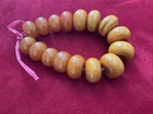 Strand 16 Phenolic Beads 1 - 1 1 2 Inch Round Amber