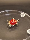 Small Turtle With A Red Insert Lapel Pin