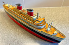 Marusan Shoten Ltd   san  S s  United States Wind Up Tin Toy