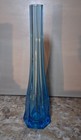 Vintage Blue Glass Bud Vase With A Flared Base And Ribbed Design