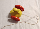 Vintage Ambi Duck Pull Toy With Large Spiraled Wheels Makes A Noise