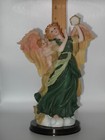 Vintage Resin Guardian Angel Playing Tambourine With Cupid Baby