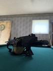Airsoft  A k M249 Featherweight