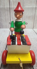 Vintage Unbranded Wooden Pinocchio Pull Toy Figure Yellow Red Green 7 5 