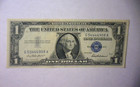 1957  1 Silver Certificate    mis-matched Serial Numbers    higher Grade    