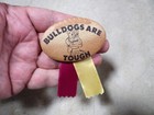 Vintage Bulldogs Are Tough Football Shaped Pin Back Button Purple   Gold