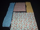 4 Different Vtg Feedsack Fabric Remnants Florals Geometric Blue Yellow Aqua Red