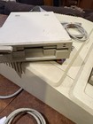 Apple Iie Computer With Numerous Manuals  Programs And Games - Not Working