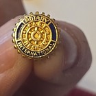 Vintage Rotary Int  Past President Gold Tone Blue Enamel Gear Logo Lapel Pin