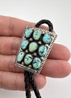 Vintage Navajo Sterling Silver Kingman Turquoise Stamped Cluster Bolo Tie