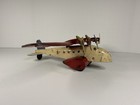 Vintage Pressed Steel 4 Engine Toy Airplane Red Cream Blue Tail Wyandotte Style
