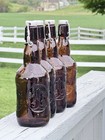 Set 4 Vintage Grolsch Amber Beer Bottles Embossed Swing Top Dutch Glass