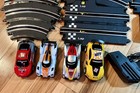 Atlasonix Slot Car Race Track 1 43 Scale Turbo Boost 4 Cars 2 Gun Split Electric