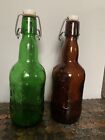 Vintage Green   Brown Glass Grolsch Beer Bottles Porcelain Flip Top Lot Of 2