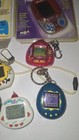 Lot Of 10  Used Broken Untested Tamagotchi Lot Giga Pets Nano Dinky Dino Virtual
