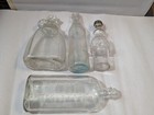 Vintage Lot Of 4 Clear Glass Bottles Vinegar  Soda   Medicine  Lotion Antique