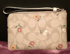 New Coach Corner Zip Wristlet In Signature Canvas With Nostalgic Ditsy Print