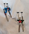 2 Vintage Barclay Lead Figures Skiers Christmas Male In Blue Female In Green