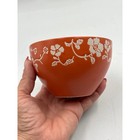 Small Orange Ceramic Bowl With Embossed Floral Pattern Echo Point