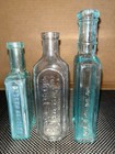 A Lot Of Three  3  Antique Medicine Bottles  glass 