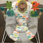 Colorful Baby Bouncer With Animal Print And Toys