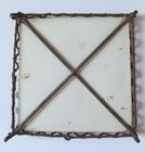 Pretty old Majolica Tile Trivet With A Loving Couple On A Metal Wired Stand