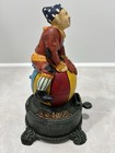 Cast Iron Spinning Clown On Globe Mechanical Coin Bank