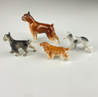 Vtg Dog Assortment Figurines  4  Border Collie Boxer Cocker Spaniel Schnauzer Bu
