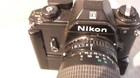 Nikon Em 35mm Slr Film Camera W nikon 70mm 210mm Lens   W power Winder  Untested