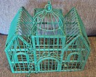 Decorative Metal Cage In The Victorian cathedral Style
