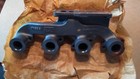John Deere Original Equipment 4 Cylinder Exhaust Manifold  r517017