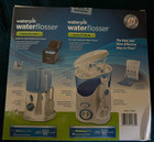 Waterpik Water Flosser Ultra And Waterpik Traveler Flosser  77808 2 Pk - Sealed