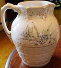 Rare Antique Victorian Dragon Handle Water Pitcher Embossed Pottery Daffodils
