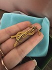 Yves Saint Laurent Golden Brass Logo Brooch