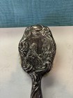 Antique Cinderella Sterling Silver Decorative Brush With Relief Design