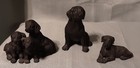 3 Black Labrador Retrievers Figurines  1 Stone Critter  2 Unmarked