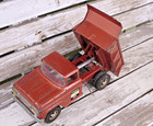 Vintage Bronze Orange Pressed Steel  Hydraulic Dump Truck Toy Works Made In Usa