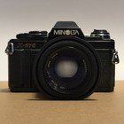 Minolta X-570 Black 35mm  with Accessories  for Parts But May Work 