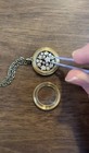 Gold-tone Crinoid Star Fossil Locket Necklace