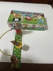 - Vintage 1950 s Tps Japan Tin Wind Up Skip Rope Mechanical Toy Works Box