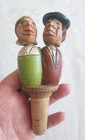 Vintage Set Of 2 Anri Style Hand Carved Mechanical Wood Bottle Stoppers