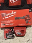      Milwaukee  M12 10-ounce Caulk   Adhesive Gun Kit New 2441-20   6 0ah Battery