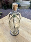 Vintage Shonfeld   s Hanging Torpedo Glass Bottle With Metal Stand