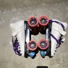 Hard Candy White Quad Roller Skates  Purple Laces  Orange Wheels  Blue Toe Stops