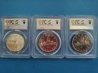 2-1947 Canada Silver Dollars And 1-1945 Canada Silver Dollar 