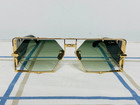 Cazal Modern Black And Gold Unisex Sunglasses With Green Lens Tinted Frame Md004