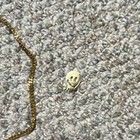 Gold Metal Chain Necklace With Skull Charm Pendant  Skull Theme  Chain Style