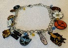 Hunger Games Katniss 12 Charm Bracelet   Includes Bonus Surprise Pin
