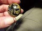 Antique  impregnated Art Glass Sewing Button  Flecks Of Colors Rotated In Light