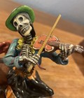 Claudio Jimenez Day Of The Dead Skeleton Musician Couple On A Log